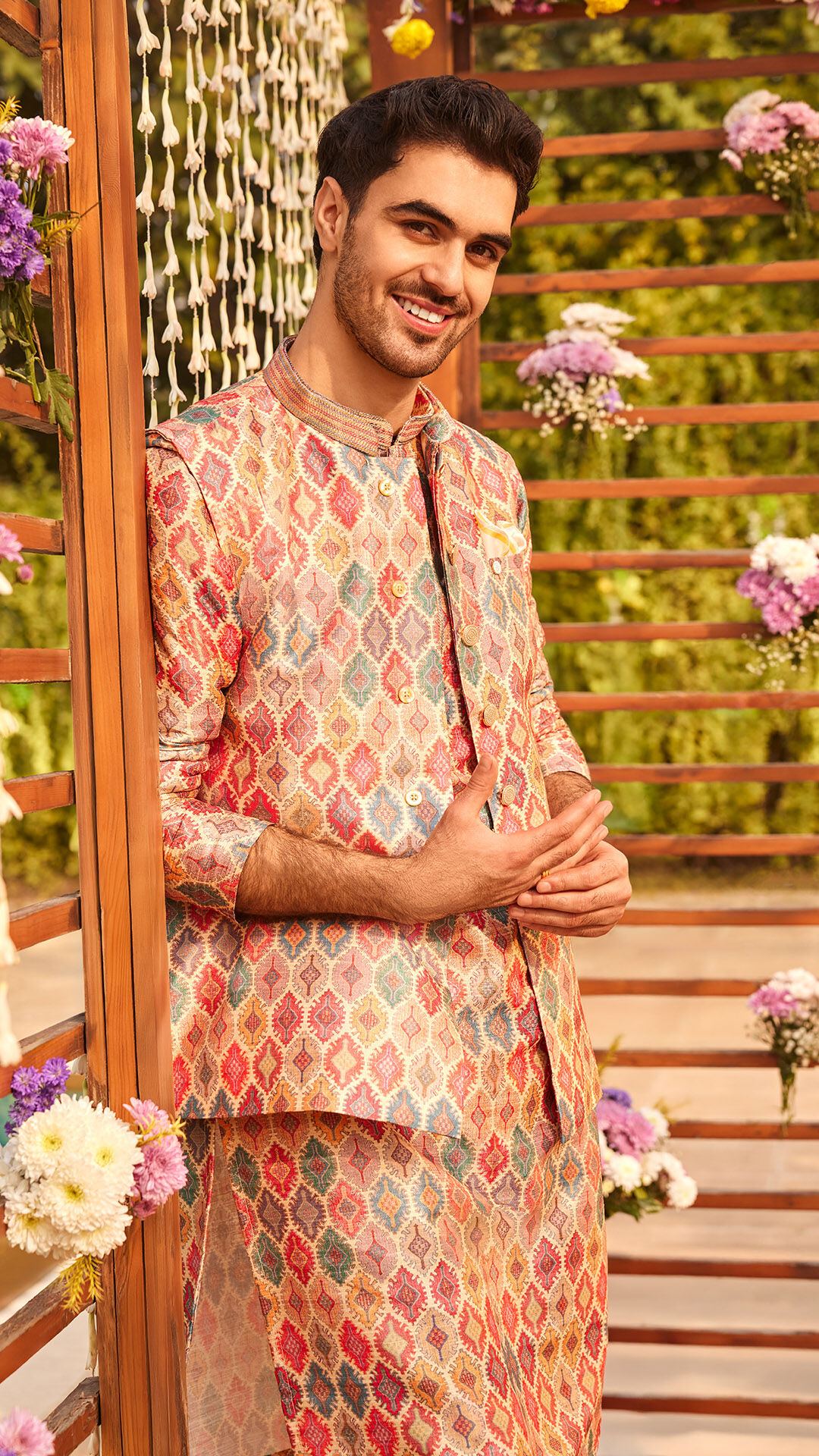 Men wearing printed kurta jacket set for sangeet ceremony